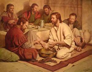 Jesus washing the Disciple's feet.